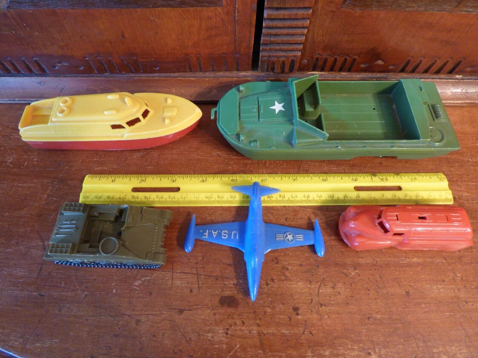 VINTAGE GROUP OF PLASTIC TOYS FROM THE 1940'S, ARMY DUCK, CABIN CRUSIER, F-80-C